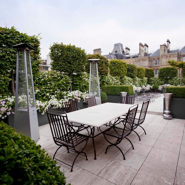 Somewhere to dine: modern Garden by Cameron Landscapes and Gardens