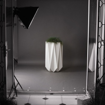 mood shot of designer modern concrete planter