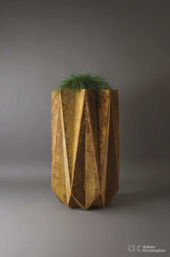 geometric fibre flower pot in rusted effect concrete