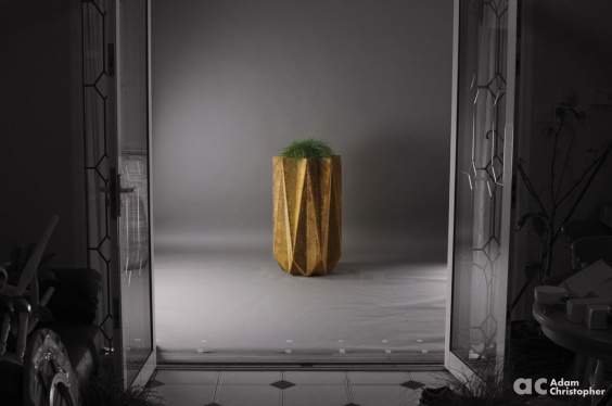 mood shot of tall modern planter in rust effect